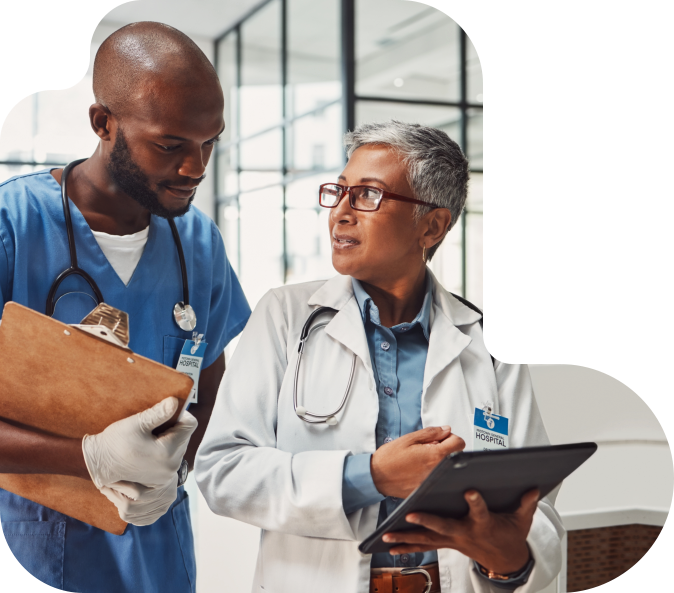 two healthcare staff talking