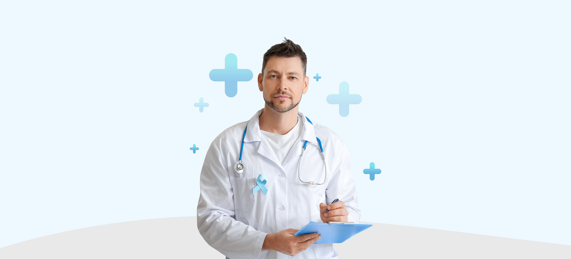 male doctor writing on clipboard