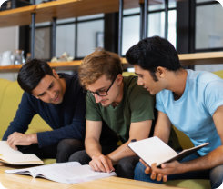 three college students studying