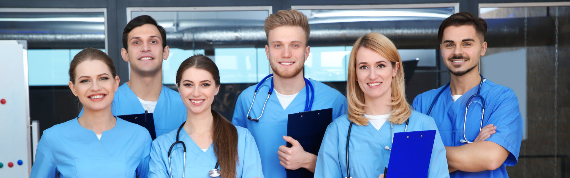 group of young doctors smiling
